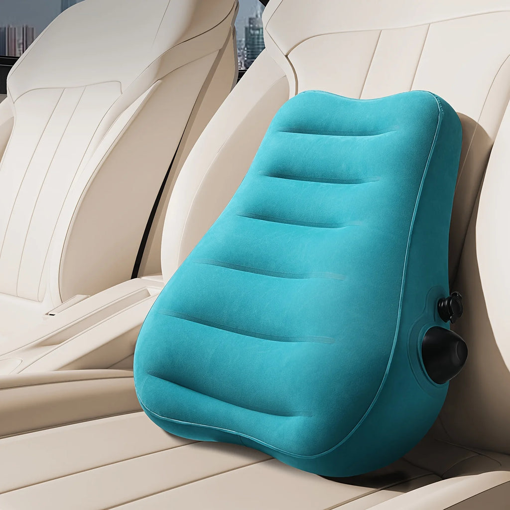MobilityBuy.com Ergonomic inflatable lumbar pillow in teal on car seat, press-type cushion with inflation valve.