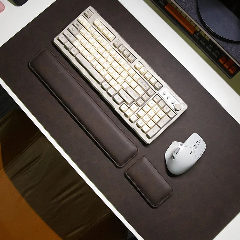 Brown desk mat PU leather, large waterproof non-slip desk pad with three wrist rests and keyboard and mouse on top