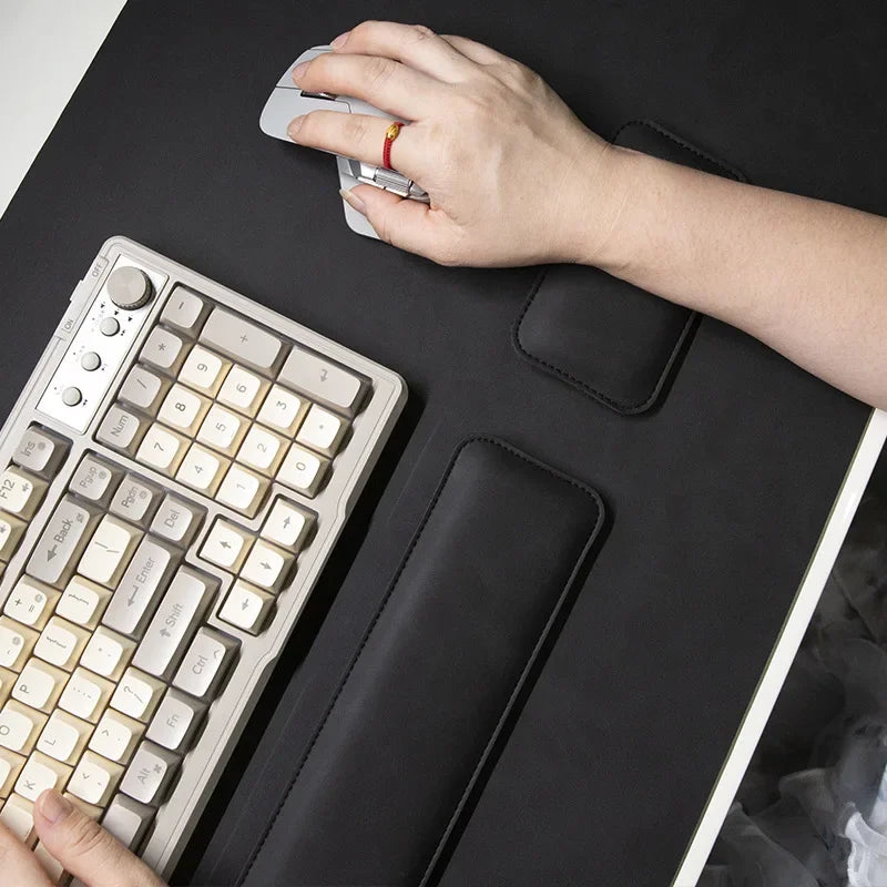 Desk Mat three-piece set by MobilityBuy.com: waterproof PU mouse pad, large black non-slip desk mat with two wrist rests.
