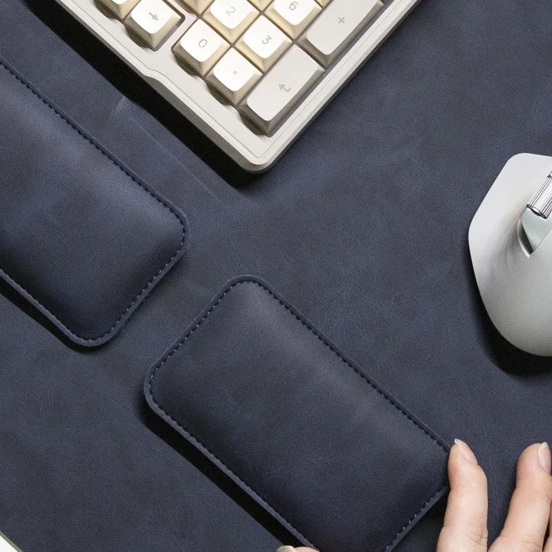 Three-piece PU leather desk mat set in navy blue with wrist rests and a large non-slip waterproof mouse pad